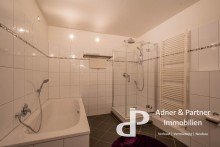 Blick in das Bad **URBANES WOHNEN IM MAGNIVIERTEL MIT BALKON UND OFFENEM WOHNBEREICH**