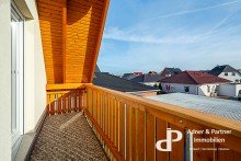 Balkon **K�NIGSLUTTER: EINFAMILIENHAUS MIT EINBAUK�CHE UND CARPORT IN ZENTRALER LAGE**